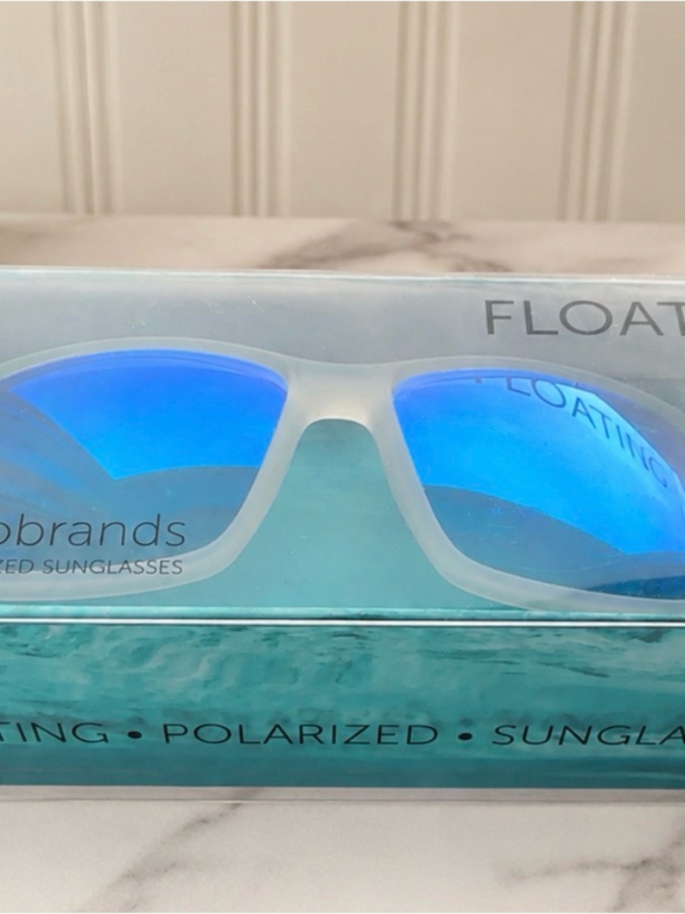 Floating Polarized Sunglasses in Blue Mirror by